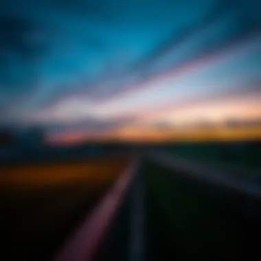 A serene view of a horse racing track during twilight