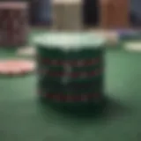 Close-up of poker chips stacked on a green felt table